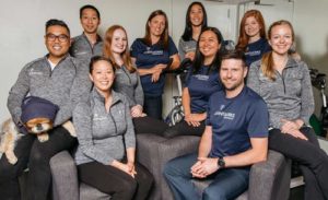 Group shot with all staff in office